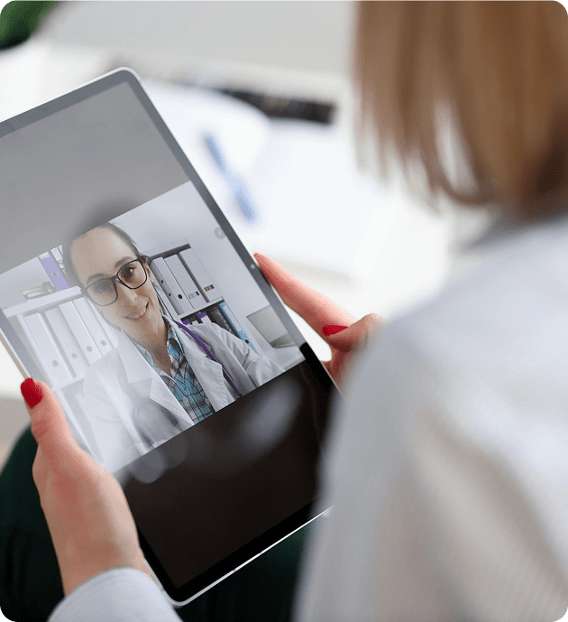 Person having a video call on tablet.